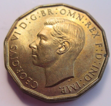Load image into Gallery viewer, KING GEORGE VI THREE PENCE 1943 BRASS UNC COIN WITH CLEAR FLIP
