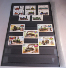 Load image into Gallery viewer, TRAINS POSTAGE STAMPS POLAND AN LIBERIA MNH IN CLEAR FRONTED STAMP HOLDER
