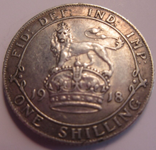 Load image into Gallery viewer, 1918 KING GEORGE V BARE HEAD VF-EF .925 SILVER ONE SHILLING COIN IN CLEAR FLIP
