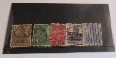 1920 REICH POST USED STAMPS 5 STAMPS (ONE WITH OVERSTAMP ) IN STAMP HOLDER