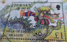 Load image into Gallery viewer, QUEEN ELIZABETH II JERSEY YEAR OF THE DRAGON MINISHEET &amp; STAMP HOLDER
