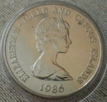 Load image into Gallery viewer, 1986 ROYAL WEDDING TURKS &amp; CAICOS UNC ONE CROWN COIN IN CLEAR CAPSULE
