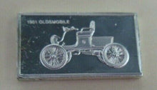 Load image into Gallery viewer, 1901 OLDSMOBILE 15mm X 10mm 1.60gram SILVER INGOT WITH INFORMATION SLIP
