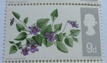 Load image into Gallery viewer, 1967 FLOWERS 9d 7 STAMPS MNH WITH CLEAR FRONTED STAMP HOLDER
