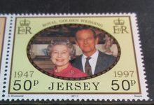 Load image into Gallery viewer, QE II JERSEY DECIMAL STAMPS GOLDEN WEDDING &amp; ROYAL WEDDING MNH IN STAMP HOLDER
