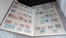 Load image into Gallery viewer, ROYAL MAIL STOCK BOOK GREEN INCLUDES MANY STAMPS - PLEASE SEE PHOTOGRAPHS
