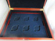 Load image into Gallery viewer, WOODEN COIN BOX HOLDS UP TO 12 £5 OR CROWN SIZED ENCAPSULATED COINS NAVY INSIDE
