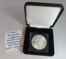 Load image into Gallery viewer, 1977 MEXICO 100 PESOS SILVER UNC WITH QUADRANT BOX &amp; CERTIFICATE OF AUTHENTICITY
