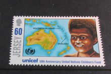 Load image into Gallery viewer, JERSEY UNICEF 50TH ANNIVERSARY DECIMAL STAMPS X 4 MNH IN STAMP HOLDER

