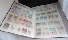 Load image into Gallery viewer, ROYAL MAIL STOCK BOOK GREEN INCLUDES MANY STAMPS - PLEASE SEE PHOTOGRAPHS
