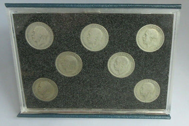 FLORIN SET OF SEVEN SILVER COINS IN CLEAR HARD CASE & ROYAL MINT BLUE BOOK