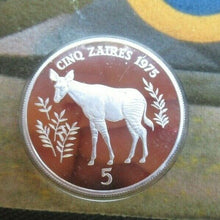 Load image into Gallery viewer, 1975 ROYAL MINT ZAIRE CONSERVATION OKAPI SILVER 5 ZAIRS COIN BOX/COA.
