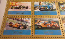 Load image into Gallery viewer, AJMAN STATE UNITED ARAB EMIRATES OLD AND MODERN CARS POSTAGE STAMPS IN HOLDER
