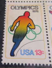 Load image into Gallery viewer, 1976 OLYMPICS USA BLOCK OF 4 13C STAMPS MNH IN STAMP HOLDER
