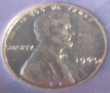 Load image into Gallery viewer, LINCOLN KENNEDY STRANGE BUT TRUE 4 COIN SET WITH STAMPS ON CARD IN SEALED PACK
