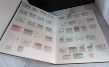 Load image into Gallery viewer, ROYAL MAIL STOCK BOOK GREEN INCLUDES MANY STAMPS - PLEASE SEE PHOTOGRAPHS
