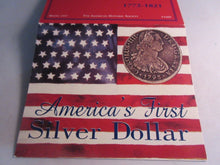 Load image into Gallery viewer, AMERICA&#39;S FIRST SILVER DOLLAR - RESTRIKE WITH INFORMATION CARD
