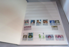 Load image into Gallery viewer, ROYAL MAIL STOCK BOOK GREEN INCLUDES MANY STAMPS - PLEASE SEE PHOTOGRAPHS
