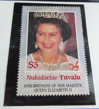 Load image into Gallery viewer, 1986 QUEEN ELIZABETH II 60TH BIRTHDAY NUKULAELAE TUVALU STAMPS &amp;ALBUM SHEET
