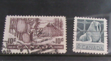 Load image into Gallery viewer, 1940&#39;s &amp; 1950&#39;s CANADA STAMPS WITH CLEAR FRONTED STAMP HOLDER
