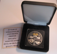 Load image into Gallery viewer, 2004 50 YEARS OF WORLD FOOD AID SILVER PLATED PROOF MEDAL CAPSULE BOX &amp; COA
