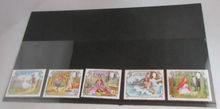 Load image into Gallery viewer, QUEEN ELIZABETH II JERSEY CHILDRENS STORIES DECIMAL STAMPS MNH IN STAMP HOLDER
