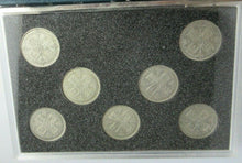 Load image into Gallery viewer, FLORIN SET OF SEVEN SILVER COINS IN CLEAR HARD CASE &amp; ROYAL MINT BLUE BOOK
