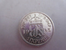 Load image into Gallery viewer, 1945 KING GEORGE VI BARE HEAD .500 SILVER UNC 6d SIXPENCE COIN IN CLEAR FLIP
