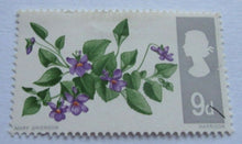 Load image into Gallery viewer, 1967 FLOWERS 9d 7 STAMPS MNH WITH CLEAR FRONTED STAMP HOLDER
