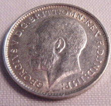Load image into Gallery viewer, 1912 KING GEORGE V BARE HEAD .925 SILVER 3d THREE PENCE COIN IN CLEAR FLIP
