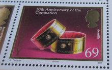Load image into Gallery viewer, QEII JERSEY 50TH ANNIVERSARY CORONATION MINISHEET &amp; CLEAR FRONTED STAMP HOLDER

