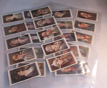 Load image into Gallery viewer, WILLS CIGARETTE CARDS CINEMA STARS COMPLETE SET OF 25 IN CLEAR PLASTIC PAGES
