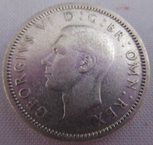 Load image into Gallery viewer, 1946 KING GEORGE VI BARE HEAD .500 SILVER VF 6d SIXPENCE COIN IN CLEAR FLIP
