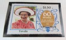 Load image into Gallery viewer, 1986 QUEEN ELIZABETH II 60TH BIRTHDAY MONTSERRAT &amp; TUVALU STAMPS &amp; ALBUM SHEET
