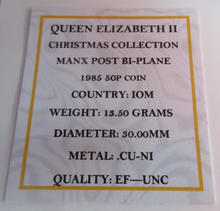 Load image into Gallery viewer, 1985 QEII CHRISTMAS COLLECTION MANX POST BI-PLANE MINT MARK AA 50P COIN BOX &amp;COA
