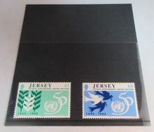 Load image into Gallery viewer, QEII JERSEY DECIMAL STAMPS 50TH ANNIVERSARY UNITED NATIONS MNH IN STAMP HOLDER
