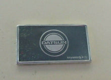 Load image into Gallery viewer, 1970 DATSUN 15mm X 10mm 1.60gram SILVER INGOT WITH INFORMATION SLIP
