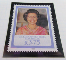 Load image into Gallery viewer, 1986 QUEEN ELIZABETH II 60TH BIRTHDAY SEYCHELLES STAMPS &amp; ALBUM SHEET
