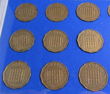 Load image into Gallery viewer, 1953-1967 QUEEN ELIZABETH II BRASS THREEPENCE 3d 15 COIN SET IN R/MINT BLUE BOOK
