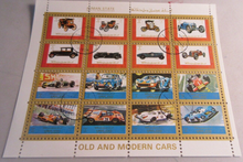 Load image into Gallery viewer, AJMAN STATE UNITED ARAB EMIRATES OLD AND MODERN CARS POSTAGE STAMPS IN HOLDER
