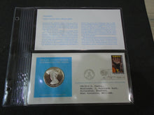 Load image into Gallery viewer, 1975 - 77 UNITED NATIONS OFFICIAL SILVER PROOF MEDAL COVER WITH STAMPS IN SLEAVE
