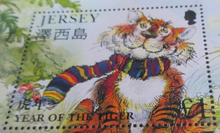 Load image into Gallery viewer, QUEEN ELIZABETH II JERSEY YEAR OF THE TIGER MINISHEET &amp; STAMP HOLDER
