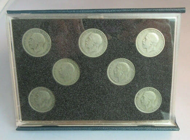 FLORIN SET OF SEVEN SILVER COINS IN CLEAR HARD CASE & ROYAL MINT BLUE BOOK