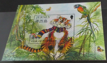 Load image into Gallery viewer, QUEEN ELIZABETH II JERSEY YEAR OF THE TIGER MINISHEET &amp; STAMP HOLDER
