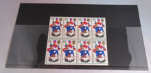 Load image into Gallery viewer, 1968 HAPPY CHRISTMAS 1/6 BLOCK OF 8 STAMPS MNH WITH CLEAR FRONTED STAMP HOLDER
