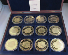 Load image into Gallery viewer, 2012 PORTRAITS OF THE QUEEN GOLD PLATED PROOF MEDAL SET WITH COA &amp; BOX 12 MEDALS
