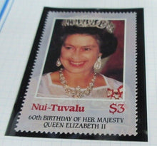 Load image into Gallery viewer, 1986 QUEEN ELIZABETH II 60TH BIRTHDAY NUI TUVALU STAMPS &amp; ALBUM SHEET
