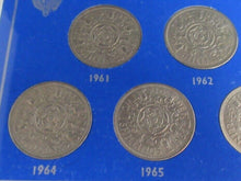 Load image into Gallery viewer, 1961-1967 QUEEN ELIZABETH II FLORINS BUNC 7 COIN SET IN ROYAL MINT BLUE BOOK
