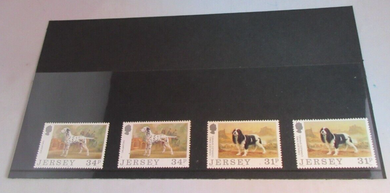 JERSEY DOGS DECIMAL STAMPS X 4 MNH IN STAMP HOLDER