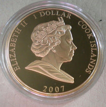 Load image into Gallery viewer, 2007 QEII &amp; PRINCE PHILIP DIAMOND WEDDING COOK ISLANDS  $1 COIN WITHIN CAPSULE
